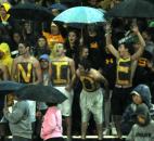 Despite the steady downpour the Snider letter guys and the rest of the student section seemed to have un-dampened spirits as Snider beat North Side 17-6 Friday night at North Side. (By Ellie Bogue of The News-Sentinel)