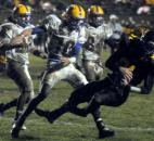 Snider’s Joshua Spitnale scores, bringing the score to Snider 9-0 over Homestead in the first quarter of play Friday night at Snider. Snider won 30-20. (By Ellie Bogue of The News-Sentinel)