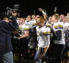 Norwell players celebrate their 22-20 upset win over New Haven in the Class 4A sectional semifinal Friday at New Haven. (By Reggie Hayes of The News-Sentinel)