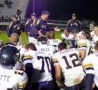 Norwell coach Jeff Miller addresses his team after their 22-20 upset win over New Haven on Friday in the Class 4A sectional semifinal game. (By Reggie Hayes of The News-Sentinel)