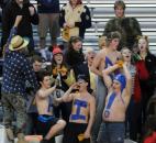 Bishop Dwenger’s student section was sporting a few early Halloween costumes at Friday night’s game against Columbia City. The Saints prevailed beating Columbia City 36-14. (By Ellie Bogue of The News-Sentinel)