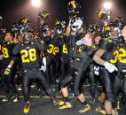 The Snider team celebrates their victory Friday night after beating Merrillville, 42-39, and will advance to IHSAA State finals next weekend in Indianapolis. Photo by Ellie Bogue