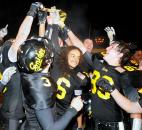 Members of the Snider Team celebrate their semi-state title Friday night after beating Merrillville, 42-39, and will advance to IHSAA State finals next weekend in Indianapolis. Photo by Ellie Bogue