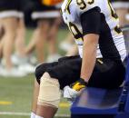 Snider's Weston Painter watches from the sidelines Saturday at Lucas Oil Stadium after getting hurt in the first quarter. Photo by Rob Edwards