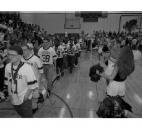 Snider players enter a school pep rally in their honor after defeating Ben Davis 24-21 in the 1992 Class 5A state finals. Under coach Russ Isaacs, the Panthers finished the season 14-0 for their only state title in program history. In addition, the 1992 Snider team is still the only Fort Wayne-area team to win a Class 5A football state title. (News-Sentinel file photo)