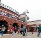 Crowds enter the main gates of Parkview Field to catch the TinCaps' home opener. (Photo by Gannon Burgett for The News-Sentinel)