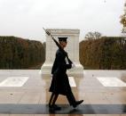 This handout photo provided by the U.S. Army shows Spc. Brett Hyde, Tomb Sentinel, 3d U.S. Infantry Regiment (The Old Guard), keeping guard over the Tomb of the Unknown Soldier during Hurricane Sandy, at Arlington National Cemetery, Va., on Monday. Just like the Sentinel's Creed says "Through the years of diligence and praise and the discomfort of the elements, I will walk my tour in humble reverence to the best of my ability."
